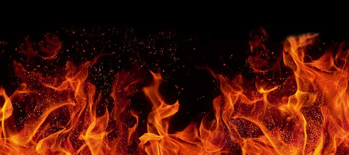 Black background with bright, sparking flames