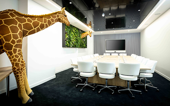 Office Space In Town's offices with whimsical giraffes