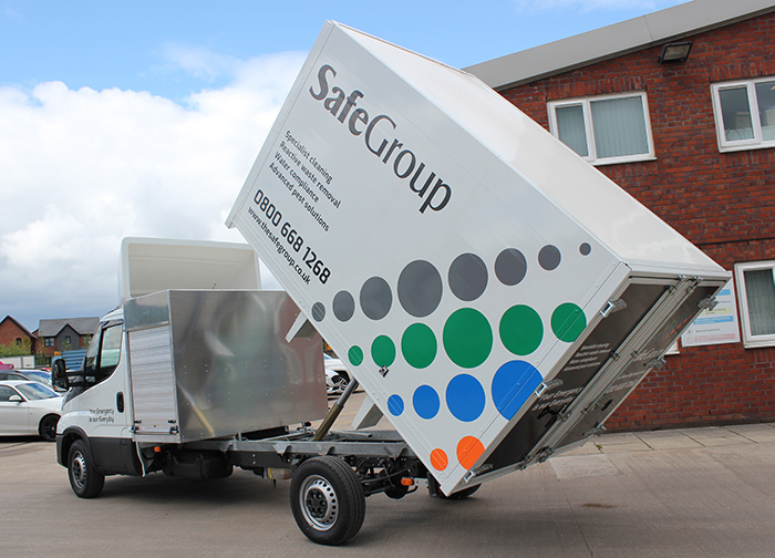 SafeGroup's new hybrid vehicle tipping its waste container