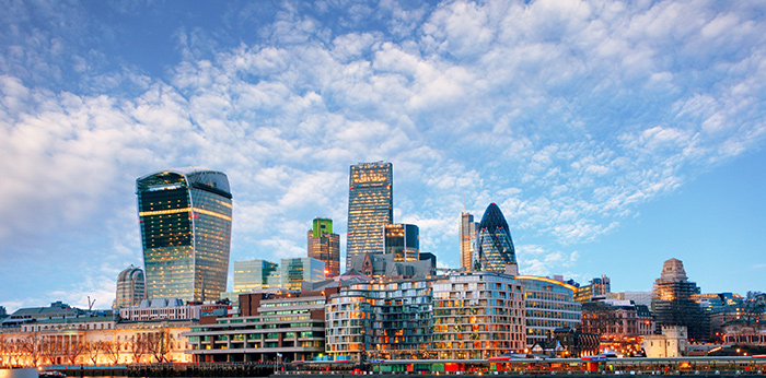 The London skyline by day, under a blue sky