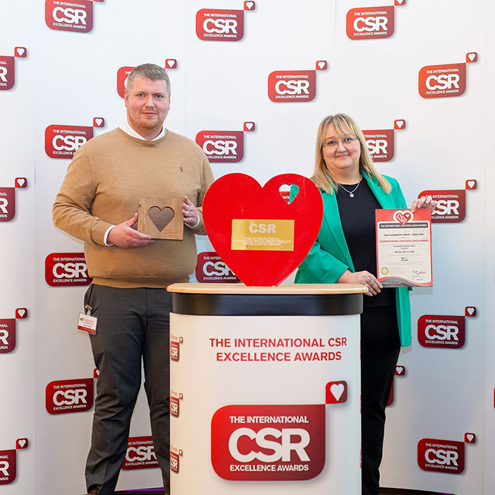 Floorbrite's Vickie McCoy and Alan Fenwick receiving The International CSR Excellence Awards