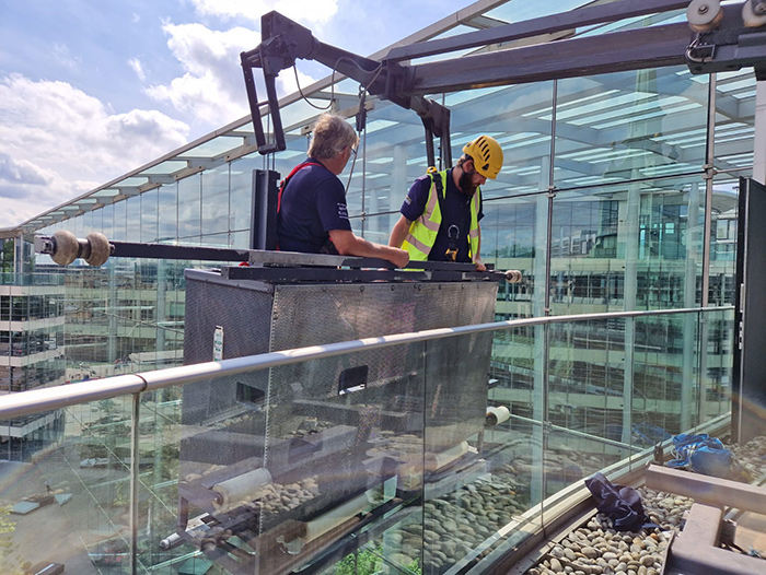 PTSG technicians working at height at Tower Place