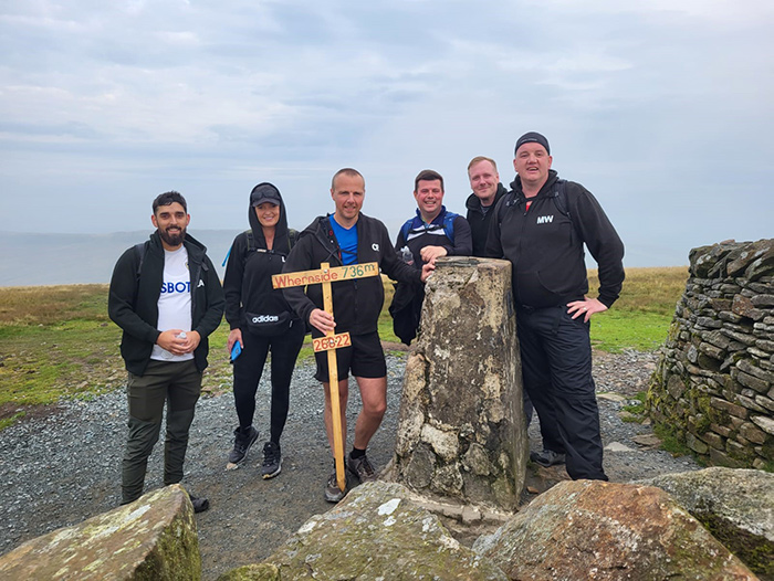 Left to Right: Zak Ahmed, Laura Steele, Carl Reed, Danny Wallace Luke Whitley and Michael Wormald from FRG at the top of the first peak, Whernside.